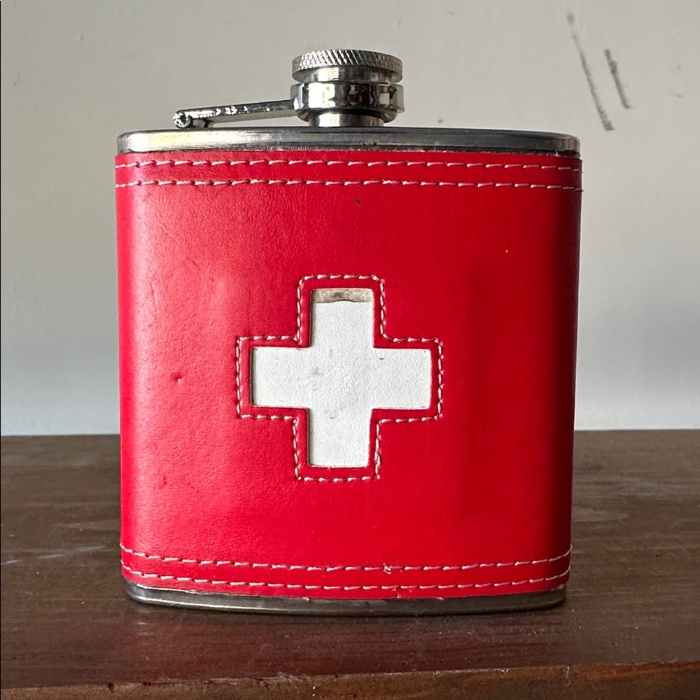 Red and White Flask with Cross Design